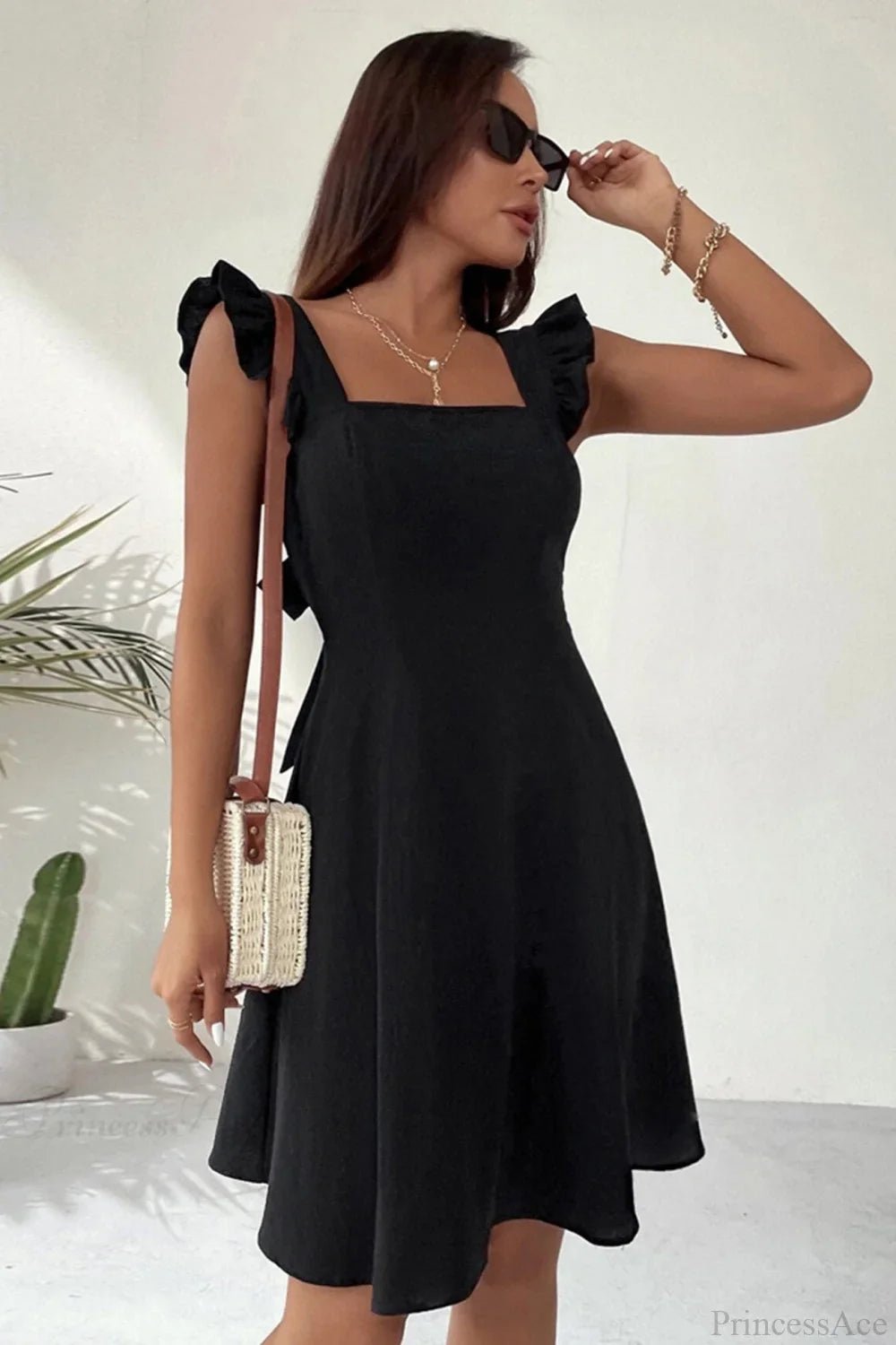SOERA Bianca Sleeveless Mini Dress with Ruffle Tie - back - Dress -  Black XS